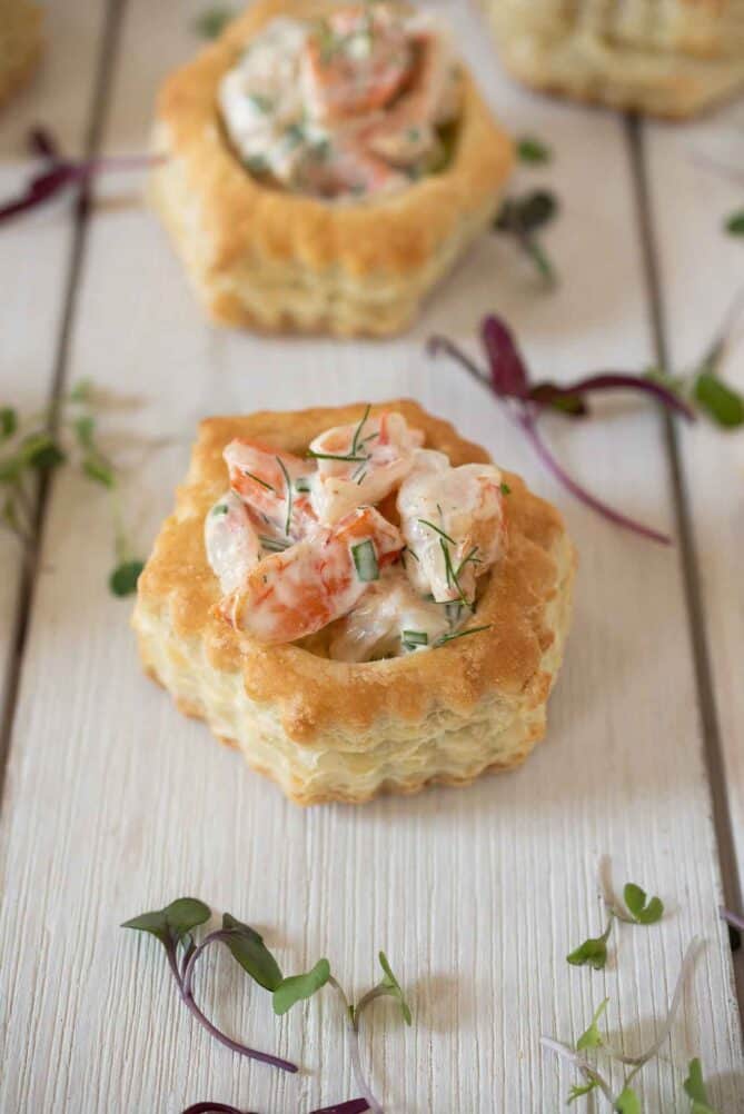 A pretty puff pastry shell filled with avocado and shrimp
