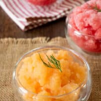 Frosty cantaloupe served with a spoon in bowls