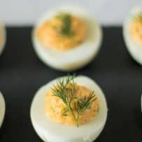 A fresh dill sprig on top of deviled eggs