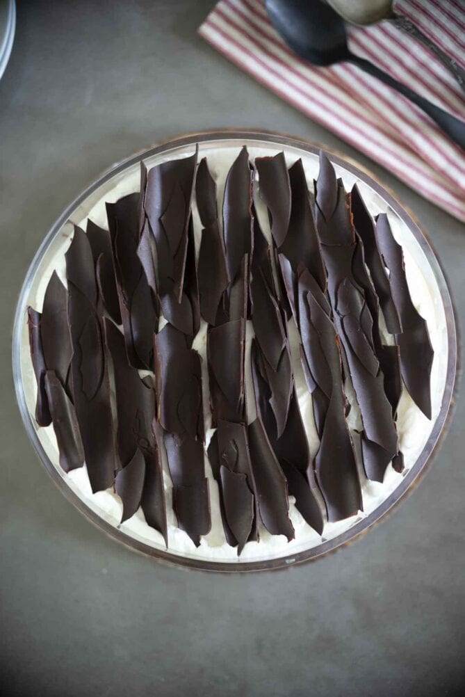An overhead view of a trifle topped with chocolate