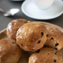 Golden brown teacake buns in a pile