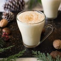 2 glass mugs of traditional homemade eggnog