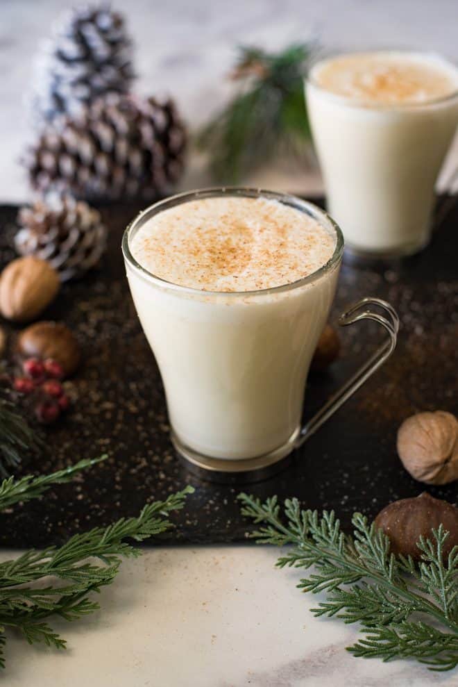 2 glass mugs of traditional homemade eggnog