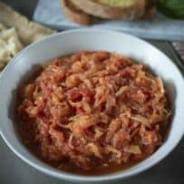 Stewed onions and tomato in a bowl