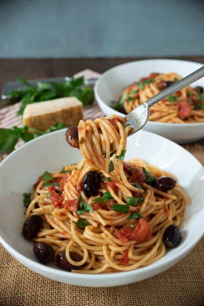 Twirling a bite of spaghetti onto a fork