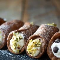 Ricotta filled cannoli with chopped pistachios