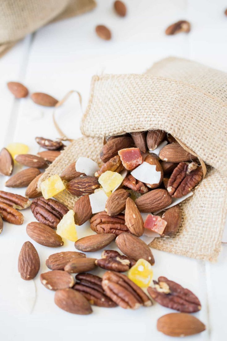 Tropical trail mix. A delicious combination of roasted almonds and pecans, dried mango, pineapple and coconut. This is the perfect anytime snack.