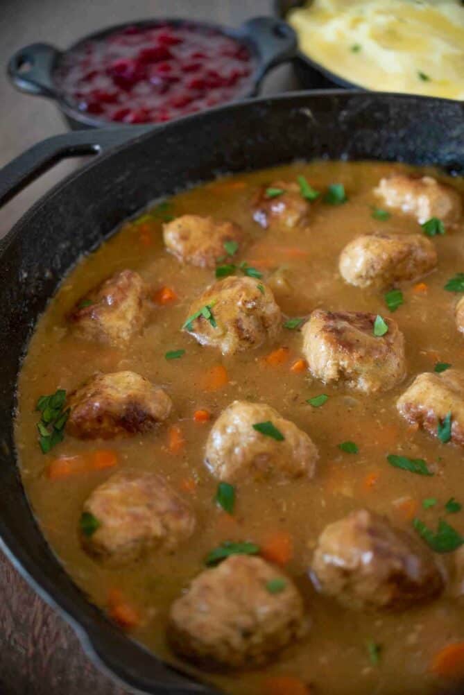 Turkey meatball and gravy casserole in a cast iron pan