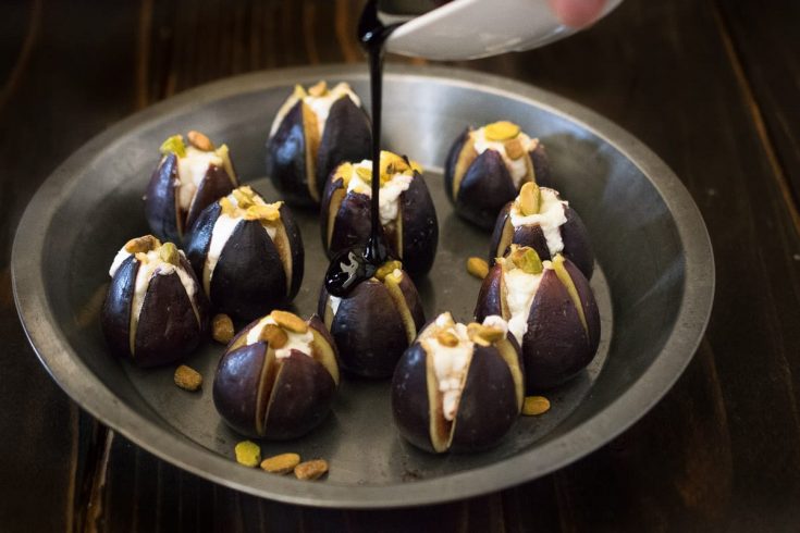 Warm figs with goat cheese, pistachios and balsamic glaze