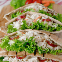 Pita pocket halves filled with tuna, grapes and lettuce